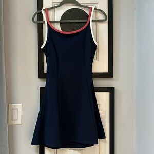Sincerely Jules navy blue open back tennis/athletic dress size S
Length 31”